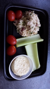Tuna Salad Snack with celery, tomatoes and rice crackers.