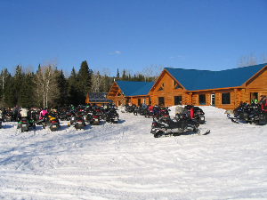 Snowmobile parking lots truly exist in the winter.